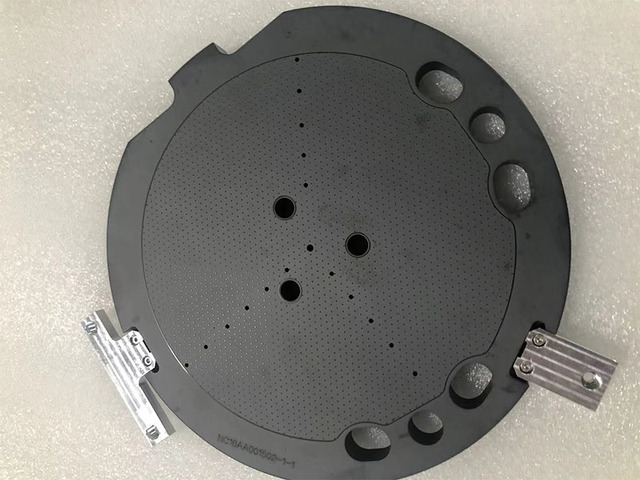 Silicon carbide vacuum chuck